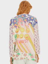 Hand-painted floral Mykonos cardigan in cream, showcasing vibrant colors and geometric designs, with uplifting text and smiley faces.