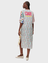 Markers collection's Stephanie dress displays vibrant hand-drawn text and a sunburst, promoting positivity and happiness.
