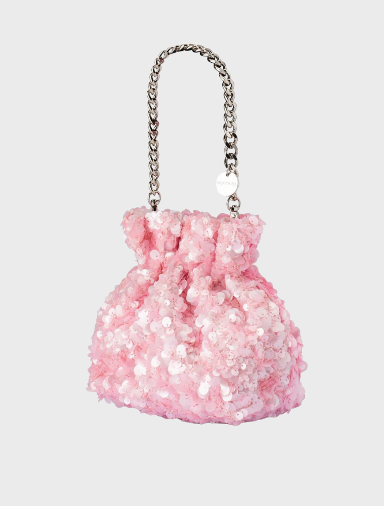Mattie Sequin Pouch in pink, adorned with a chain strap, ideal for a trendy and stylish look.