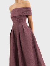 Off-the-shoulder midi dress in a soft moonlight mauve, combining a fitted bodice with a flowing skirt for a sophisticated style.