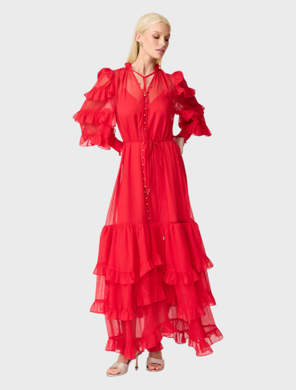 A vibrant red dress with long length and stylish ruffled sleeves, showcasing a bold fashion statement.