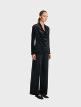 Stylish black drape top showcasing a contemporary design and comfortable fit.