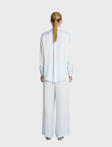 Comfortable soft shirt in glacier blue, featuring a loose fit and soft fabric, suitable for casual settings.