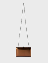 Stylish metallic clutch bag made of shiny metal, designed with a contemporary look and reflective surface.