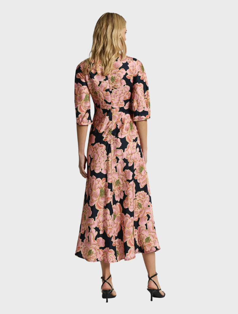 Kimberly Midi is a pink dress with a flattering midi length, combining style and comfort for a variety of settings.