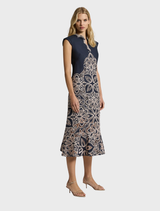 Sierra Midi dress in navy and blush colors, featuring a chic design that combines comfort and style for any event.
