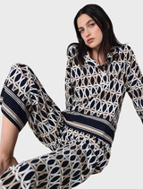 Top in midnight blue with multi-colored accents, featuring a stylish design suitable for various occasions.