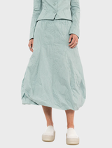Stylish mint poplin skirt with an eye-catching print, ideal for casual or semi-formal events.