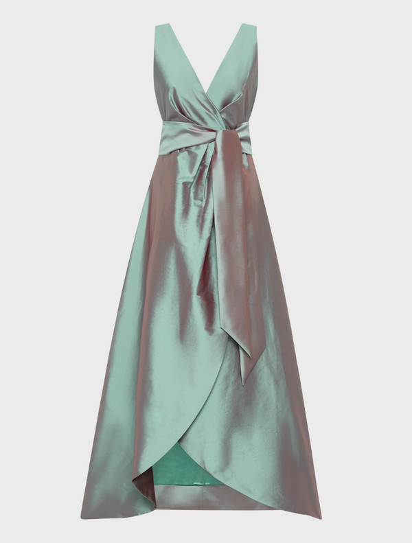 A stylish dress adorned with bows at the front and back, adding a charming touch to its overall appearance.
