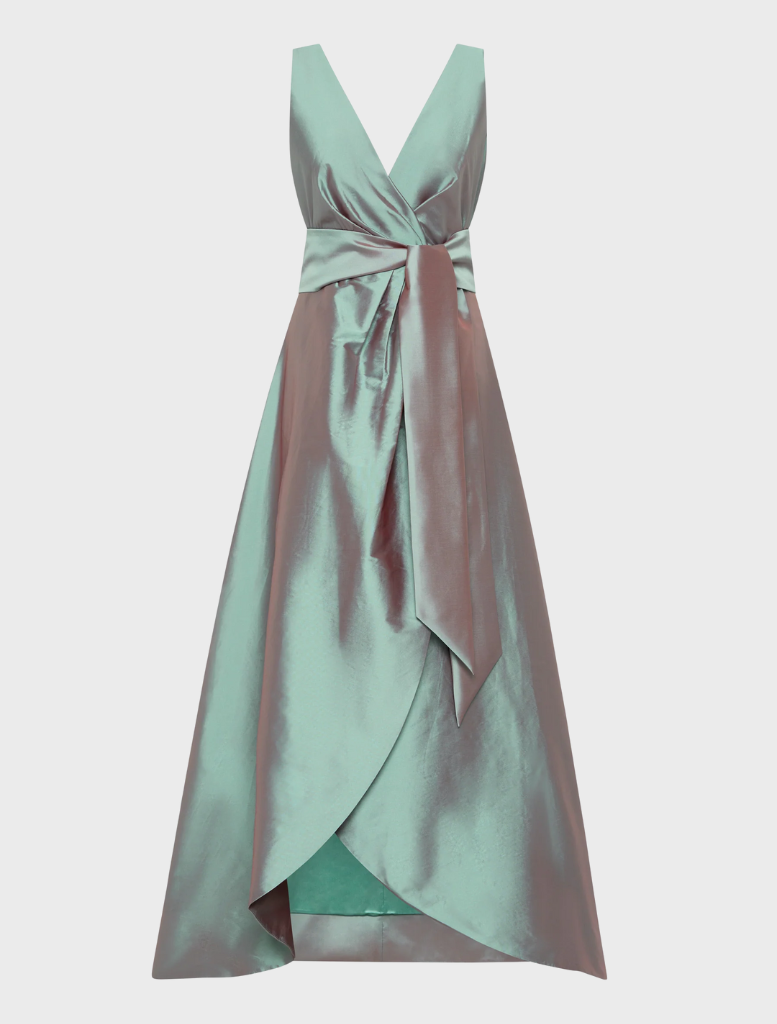A stylish dress adorned with bows at the front and back, adding a charming touch to its overall appearance.