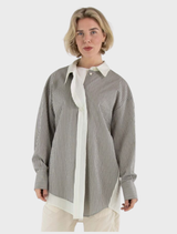 Grey Mira blouse featured on a hanger, emphasizing its chic style and comfortable fabric.