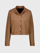 Stylish cropped trench jacket in mocca, featuring a stand-up collar, snap-button placket, and intricately designed sleeve hems.