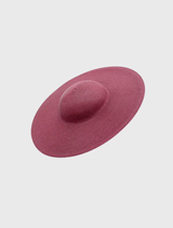 Elegant burgundy racewear hat with a sculptural shape and fitted headband, ideal for formal occasions.