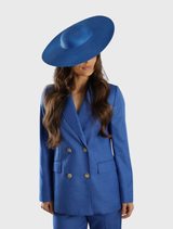 Royal blue structured racewear hat with a minimalist design and fitted headband for secure, stylish wear on race day.