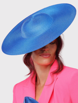 Royal blue structured racewear hat with a minimalist design and fitted headband for secure, stylish wear on race day.