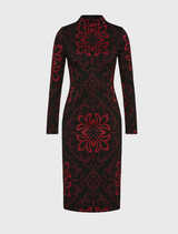 Monica Shift Dress features a bold red and black design, high neckline, long sleeves, and a fitted above-the-knee silhouette.