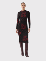 Above-the-knee red and black baroque dress with long sleeves, high neckline, and a sleek fitted silhouette in stretch knit.