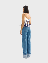 Monty Top featuring a royal stripe pattern in vibrant colors, showcasing a stylish and modern design.