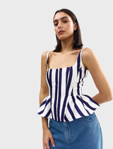 Monty Top displaying a striking royal stripe pattern, combining elegance and contemporary style in its design.