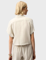 Zipper front jacket in a soft moonstone hue, combining fashion and functionality for everyday wear.
