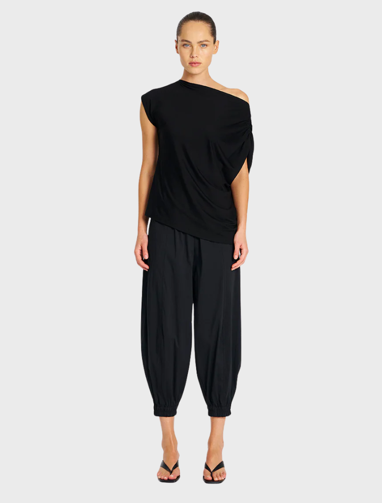 Black Moroccan pants with a relaxed fit, featuring a comfortable waistband and stylish design for casual wear.