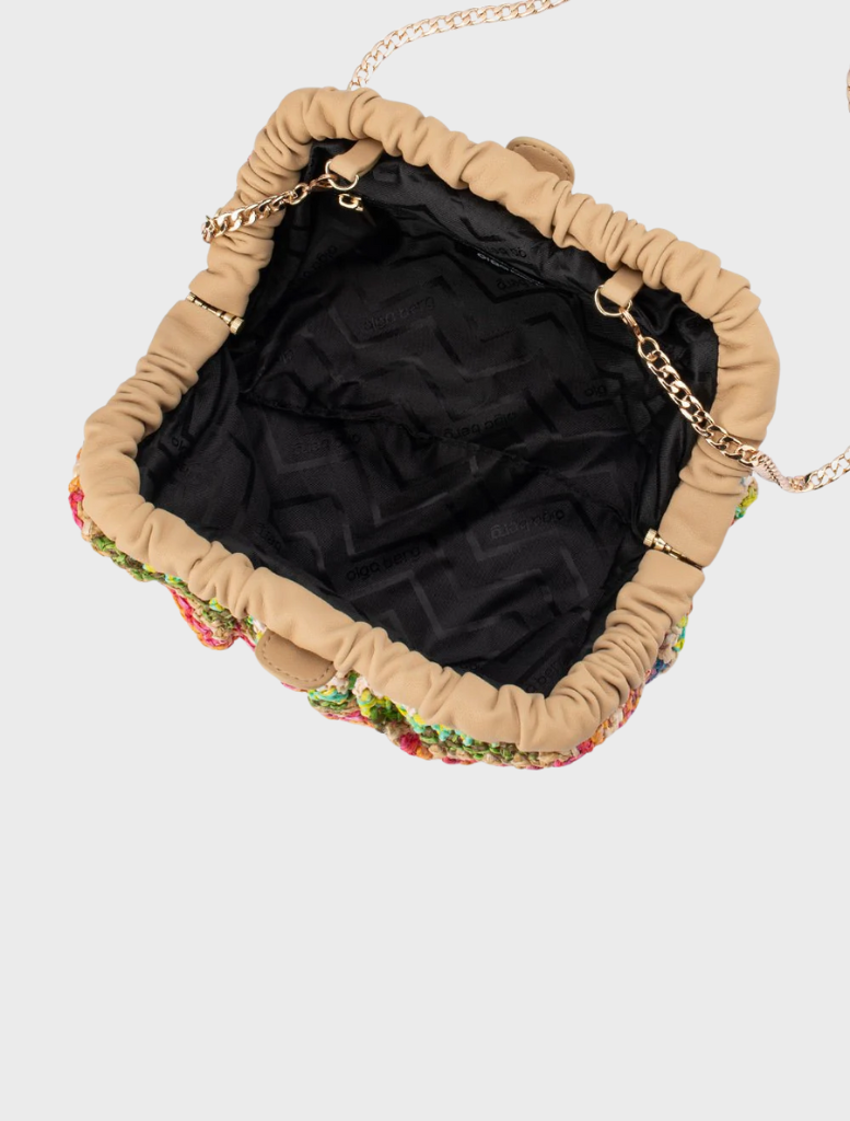 A vibrant  multi-colored woven clutch bag the Amalia Petite Gathered Clutch perfect for adding flair to any outfit.