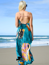 A charming dress with a bright multi-fish motif, designed for casual wear and summer festivities.