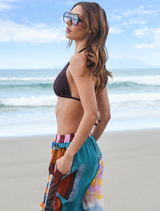 Step Into Sunshine Shorts adorned with a lively multifish design, ideal for adding a playful touch to summer wardrobes.