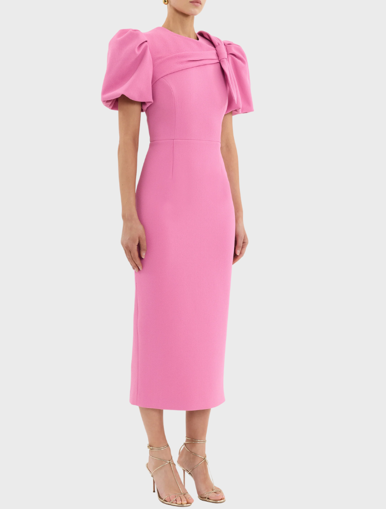 The Muriel Midi Dress in pink features a stretchy fabric, highlighting its comfortable and stylish fit.