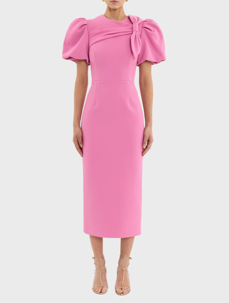Elegant pink Muriel Midi Dress with a decorative bow on the shoulder, perfect for formal occasions.
