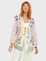 Mykonos cardigan with hand-painted flowers in pink, purple, and orange on cream, featuring geometric patterns and motivational text.