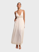 Ivory Nalaya Dress featuring a flowing silhouette and elegant design, perfect for formal occasions or summer events.