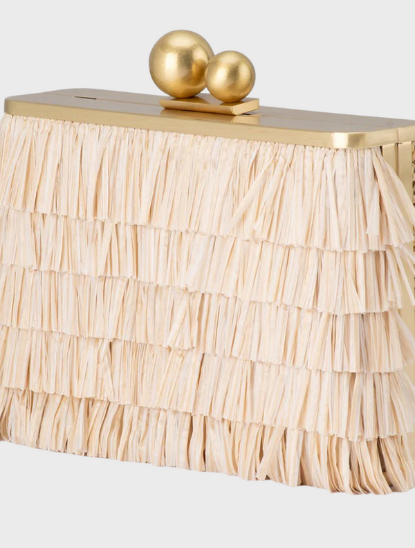 White fringe clutch bag labeled Carlita Fringe Clutch - Natural showcasing a stylish and textured design.