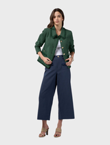 Linen blend jacket in jungle green with frayed edging, detailed trim, and panel seams for an ideal fit. Fully lined.
