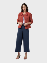 Sandalwood jacket made of linen blend, showcasing frayed edges and panel seams, fully lined for comfort and style.