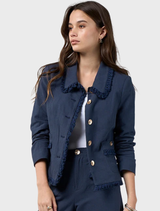 Navy linen blend jacket with frayed edges, detailed trim, and front and back panel seams for a tailored fit. Fully lined.
