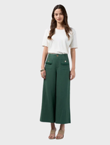 Navi Pants in jungle green feature a linen blend, elastic back waist, and frayed edges for a comfortable, chic design.