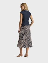 Stylish Sierra Midi dress in navy and blush, offering a graceful silhouette ideal for both day and evening wear.