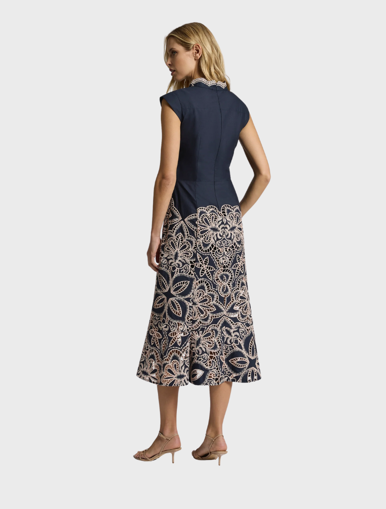 Stylish Sierra Midi dress in navy and blush, offering a graceful silhouette ideal for both day and evening wear.