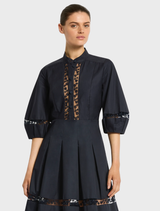 Stylish navy short dress by Olivia, featuring a comfortable fit and perfect for warm-weather occasions.