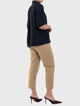 Navy Placket Plaza Top showcasing a refined look, ideal for both work and leisure settings.