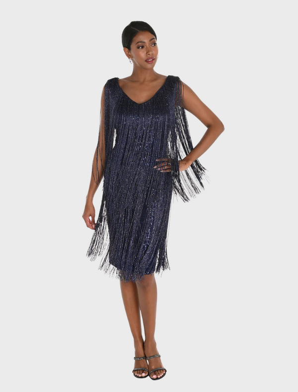 A 1920s flapper dress featuring a black sequinned fringe, showcasing the era's iconic fashion style and glamour.