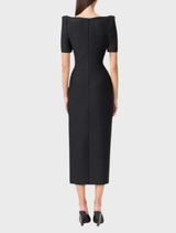 Black column maxi dress showcasing a square neckline, designed for a sleek and sophisticated look.