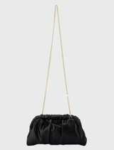 Stylish black clutch with vegan leather, gold hardware, and a roomy interior, perfect for events and daily use.