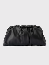 Black NIX Gathered Soft Clutch with gathered detailing, gold hardware, and removable shoulder chain for hands-free use.