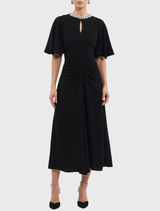 Elegant black midi dress with diamante details, crew neck, flounce sleeves, and a ruched waist, perfect for special occasions.