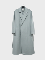 The Noor coat showcases a contemporary silhouette, crafted from high-quality material for both comfort and style.