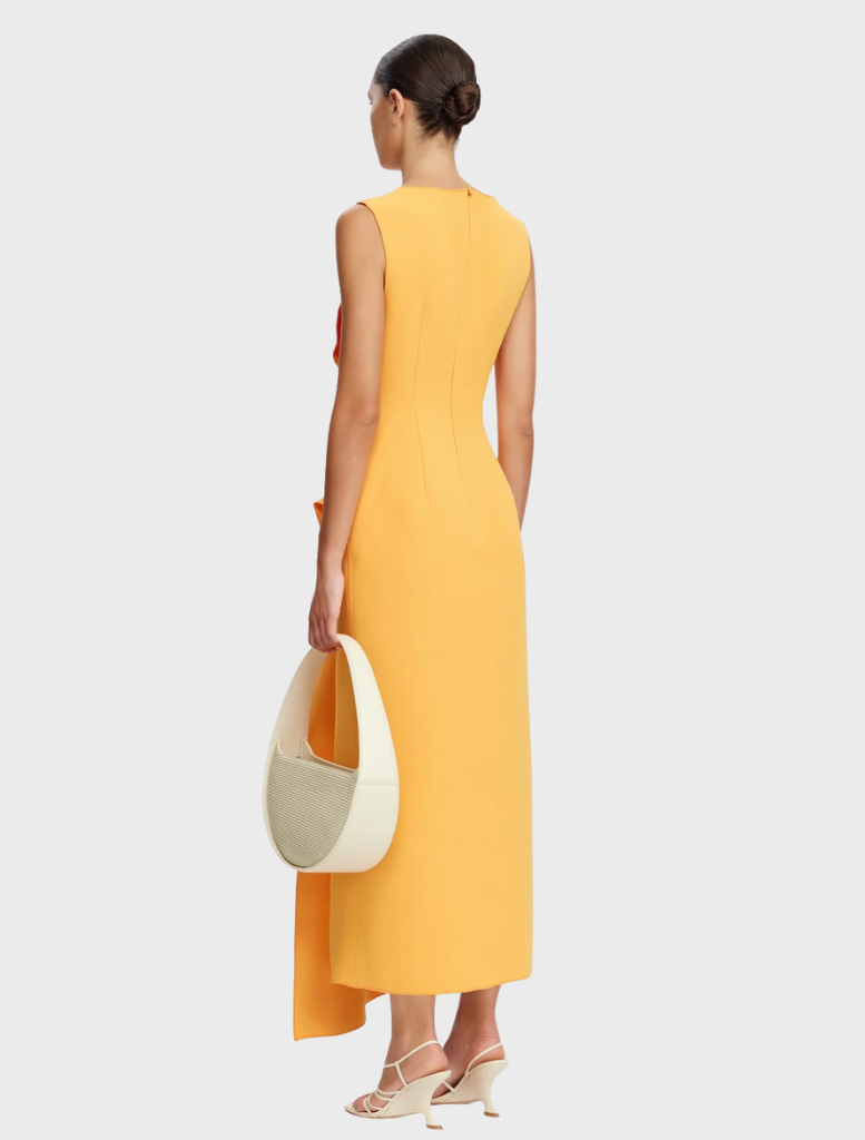 Normanhill Midi Dress in a striking Neon Mango hue, ideal for adding a pop of color to your wardrobe.