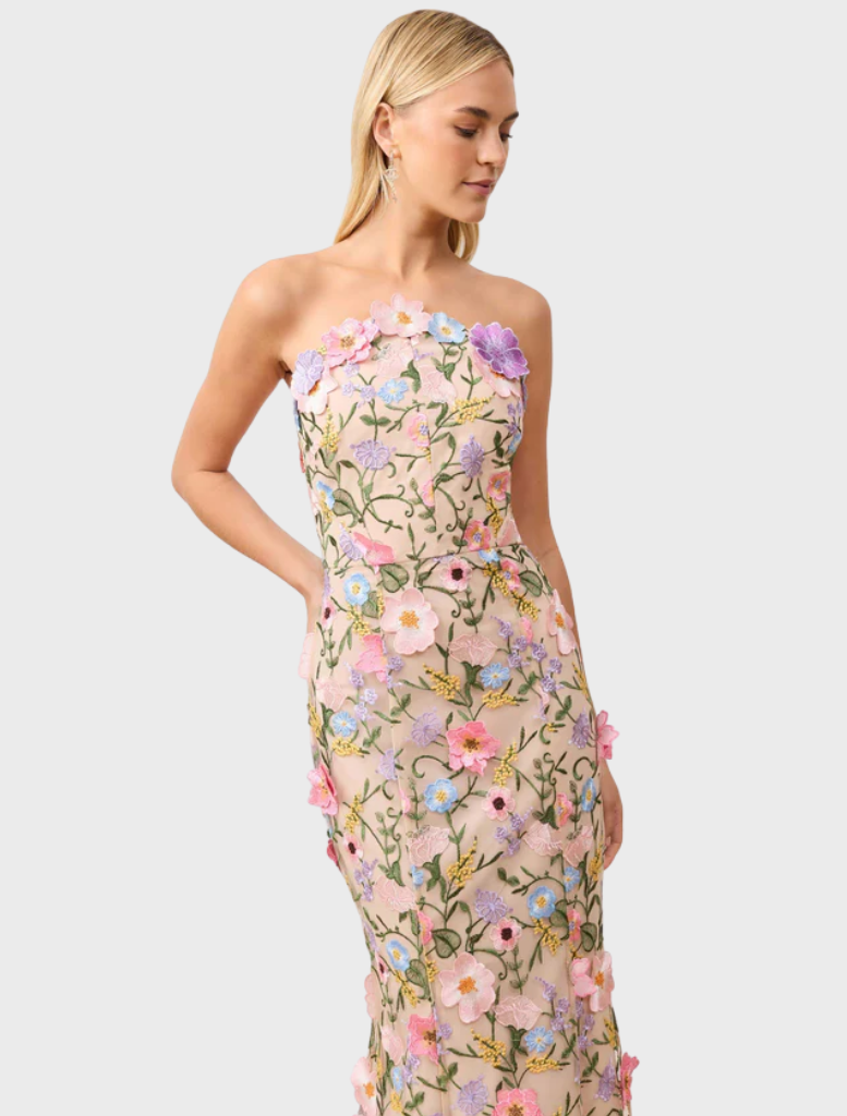 Strapless gown with a beautiful floral print fabric, perfect for formal occasions or summer events.