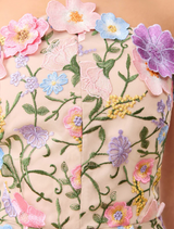 Strapless floral gown made from vibrant floral print fabric, showcasing a stylish and elegant design.